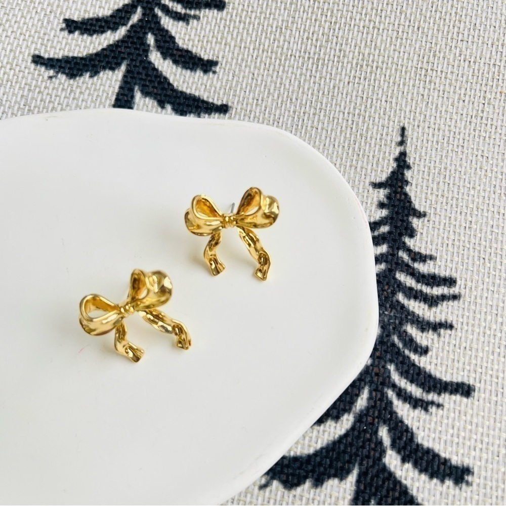 Anthropologie bow tie gold earrings